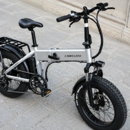 Bikesly folding fat-tire e-bike with 20-inch aluminum frame on a city street
