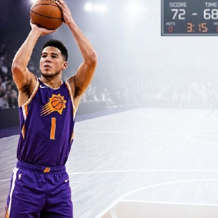 Devin Booker in Phoenix Suns uniform featured for his biography and NBA career article