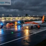 EasyJet flight U2238 emergency landing Newcastle airport with ambulances and emergency services on the runway at night