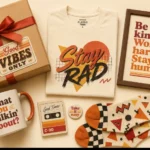 Flat-lay of whatutalkingboutwillis gift guide items including a quote mug, graphic tee, framed print, and gift box in retro styling