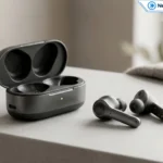 Wireless earbuds and charging case on a minimal studio background